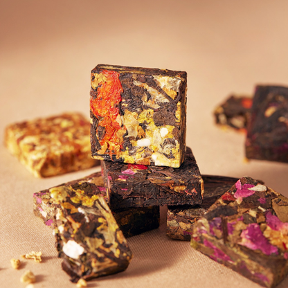 Flower Goddess's Basket tea bricks showing the tea and flower ingredients