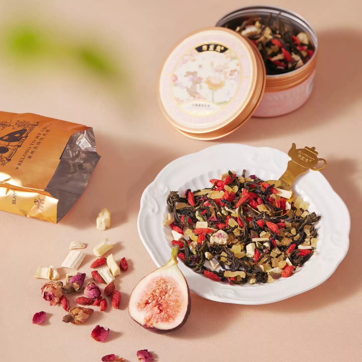 Nightingale and Rose loose tea with floral tin and gold spoon