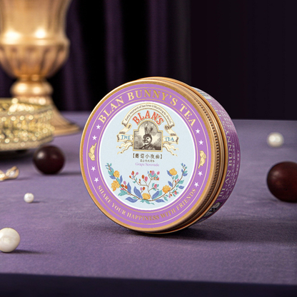 Grape Serenade Herbal Tea — styled classic tin showcase