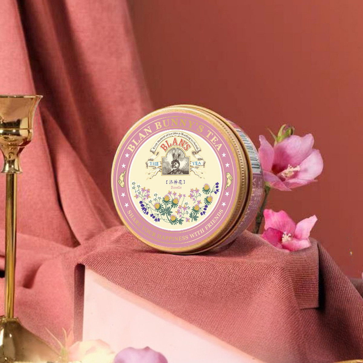 Roselle Hibiscus Herbal Tea — styled tin with flowers